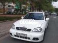 Daewoo Lanos MT 2003 - Cần bán gấp Daewoo Lanos MT năm 2003, màu trắng, nhập khẩu nguyên chiếc, giá chỉ 80 triệu