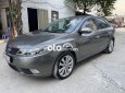 Kia Forte  MT 2010 - Cần bán gấp Kia Forte MT đời 2010, màu xám, nhập khẩu nguyên chiếc chính chủ