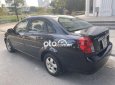 Daewoo Lacetti   EX 2010 - Cần bán Daewoo Lacetti EX sản xuất năm 2010, màu đen số sàn, giá 150tr