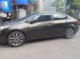 Kia K3 2014 - Cần bán lại xe Kia K3 2.0 AT sản xuất năm 2014, màu nâu