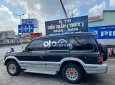Mitsubishi Pajero 2.4 2000 - Cần bán lại xe Mitsubishi Pajero 2.4 đời 2000, màu xanh lam còn mới, giá 90tr