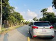 Kia Rondo   2.0 GAT 2015 - Cần bán gấp Kia Rondo 2.0 GAT năm 2015, màu bạc còn mới