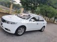 Kia Forte MT 2009 - Bán Kia Forte MT sản xuất năm 2009, màu trắng, nhập khẩu nguyên chiếc