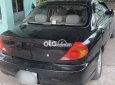 Kia Spectra  MT 2004 - Bán xe Kia Spectra MT sản xuất năm 2004, màu đen, nhập khẩu nguyên chiếc, xe gia đình