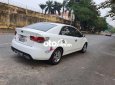 Kia Forte MT 2009 - Bán Kia Forte MT sản xuất năm 2009, màu trắng, nhập khẩu nguyên chiếc