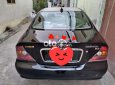 Daewoo Magnus 2004 - Cần bán lại xe Daewoo Magnus năm 2004, màu đen, giá 180tr