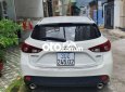 Mazda 3  1.5AT  2016 - Cần bán lại xe Mazda 3 1.5AT năm sản xuất 2016, màu trắng