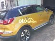 Kia Sportage 2011 - Cần bán gấp Kia Sportage 1.6GDi sản xuất năm 2011, màu vàng, nhập khẩu