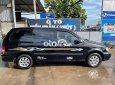 Kia Carnival 2007 - Cần bán lại xe Kia Carnival năm sản xuất 2007, màu đen giá cạnh tranh