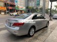 Toyota Camry  2.0E 2009 - Cần bán lại xe Toyota Camry 2.0E sản xuất 2009, màu bạc, nhập khẩu