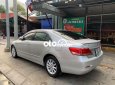 Toyota Camry  2.0E 2009 - Cần bán lại xe Toyota Camry 2.0E sản xuất 2009, màu bạc, nhập khẩu