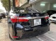 Toyota Corolla altis 2017 - Bán gấp Toyota Corolla Altis 1.8G AT năm 2017, màu đen, còn nguyên dàn lốp, xe rất mới, giá tốt