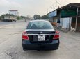 Daewoo Gentra 1.5MT 2009 - Bán xe Daewoo Gentra 1.5MT sản xuất 2009, màu đen giá cạnh tranh