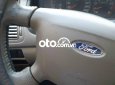 Ford Laser  GHIAAT 2004 - Bán ô tô Ford Laser GHIAAT sản xuất năm 2004, màu đen xe gia đình, giá 165tr