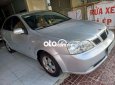 Daewoo Lacetti  EX 2005 - Cần bán gấp Daewoo Lacetti EX năm sản xuất 2005, màu bạc, giá 120tr