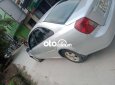 Daewoo Lacetti MT 2005 - Cần bán gấp Daewoo Lacetti MT năm sản xuất 2005, màu bạc, giá chỉ 85 triệu