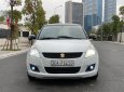 Suzuki Swift 2015 - Cần bán lại xe Suzuki Swift 1.4AT sản xuất 2015, màu trắng, giá tốt