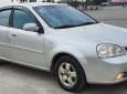 Daewoo Lacetti MT 2005 - Cần bán gấp Daewoo Lacetti MT năm 2005, màu bạc xe gia đình