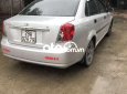 Daewoo Lacetti SE 2004 - Cần bán Daewoo Lacetti SE sản xuất năm 2004, màu bạc giá cạnh tranh