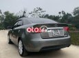 Kia Forte 2009 - Bán ô tô Kia Forte SLI 1.6AT sản xuất năm 2009, màu xám, nhập khẩu nguyên chiếc