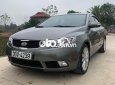 Kia Forte 2009 - Bán ô tô Kia Forte SLI 1.6AT sản xuất năm 2009, màu xám, nhập khẩu nguyên chiếc