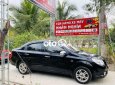 Chevrolet Aveo   LT 2014 - Cần bán Chevrolet Aveo LT sản xuất 2014, màu đen, nhập khẩu