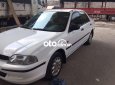 Ford Laser    1.6  1999 - Cần bán lại xe Ford Laser 1.6 năm 1999, màu trắng, nhập khẩu, 155 triệu