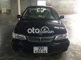 Toyota Corolla 1.6 GLi 2001 - Bán Toyota Corolla 1.6 GLi năm 2001, màu đen, giá 132tr