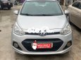 Hyundai Grand i10 MT 2015 - Cần bán gấp Hyundai Grand i10 MT sản xuất 2015, màu bạc số sàn, giá 215tr