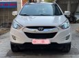 Hyundai Tucson 2013 - Cần bán gấp Hyundai Tucson ATH sản xuất 2013, màu trắng, nhập khẩu nguyên chiếc