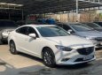 Mazda 6 2016 - Cần bán gấp Mazda 6 sản xuất 2016, màu trắng, cam kết xe không đại tu động cơ hộp số, bao check hãng thaoir mái