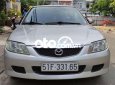 Mazda 323  MT 2002 - Cần bán xe Mazda 323 MT sản xuất 2002, màu bạc, nhập khẩu nguyên chiếc chính chủ