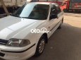 Ford Laser    1.6  1999 - Cần bán lại xe Ford Laser 1.6 năm 1999, màu trắng, nhập khẩu, 155 triệu