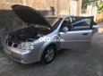 Daewoo Lacetti MT 2004 - Bán Daewoo Lacetti MT năm sản xuất 2004, màu bạc, 101tr