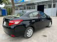 Toyota Vios E 2015 - Cần bán xe Toyota Vios E sản xuất năm 2015, màu đen, 313tr