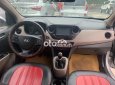 Hyundai Grand i10 MT 2015 - Cần bán gấp Hyundai Grand i10 MT sản xuất 2015, màu bạc số sàn, giá 215tr