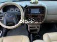 Ford Escape  XLT 2003 - Bán Ford Escape XLT năm 2003, màu đen còn mới