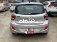 Hyundai Grand i10 MT 2015 - Cần bán gấp Hyundai Grand i10 MT sản xuất 2015, màu bạc số sàn, giá 215tr