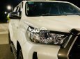 Toyota Hilux   2.4E 2020 - Bán ô tô Toyota Hilux 2.4E năm sản xuất 2020, màu trắng, xe nhập, giá 699tr