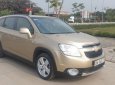 Chevrolet Orlando 2012 - Cần bán lại xe Chevrolet Orlando LTZ năm sản xuất 2012, màu vàng, giá chỉ 310 triệu