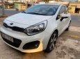 Kia Rio AT 2014 - Cần bán Kia Rio AT sản xuất năm 2014, màu trắng