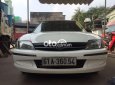 Ford Laser    1.6  1999 - Cần bán lại xe Ford Laser 1.6 năm 1999, màu trắng, nhập khẩu, 155 triệu