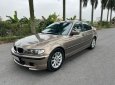 BMW 325i 2003 - Cần bán lại xe BMW 325i sản xuất năm 2003, màu nâu, 148 triệu