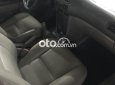 Toyota Corolla 1.6 GLi 2001 - Bán Toyota Corolla 1.6 GLi năm 2001, màu đen, giá 132tr