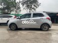 Hyundai Grand i10 MT 2015 - Cần bán gấp Hyundai Grand i10 MT sản xuất 2015, màu bạc số sàn, giá 215tr