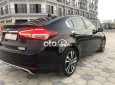 Kia Cerato   AT 2018 - Cần bán gấp Kia Cerato AT năm 2018, màu đen