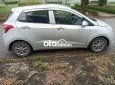 Hyundai Grand i10 2015 - Cần bán xe Hyundai Grand i10 năm sản xuất 2015, màu bạc, xe nhập chính chủ giá cạnh tranh