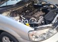 Ford Laser   Ghia 1.8 MT 2002 - Cần bán xe Ford Laser Ghia 1.8 MT sản xuất năm 2002, màu bạc 