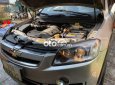 Chevrolet Captiva LT 2.0 2010 - Cần bán gấp Chevrolet Captiva LT 2.0 năm sản xuất 2010, màu bạc số tự động