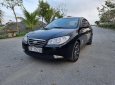 Hyundai Elantra 2009 - Cần bán Hyundai Elantra 1.6MT sản xuất năm 2009, màu đen, xe nhập, cam kết xe không ngập nước